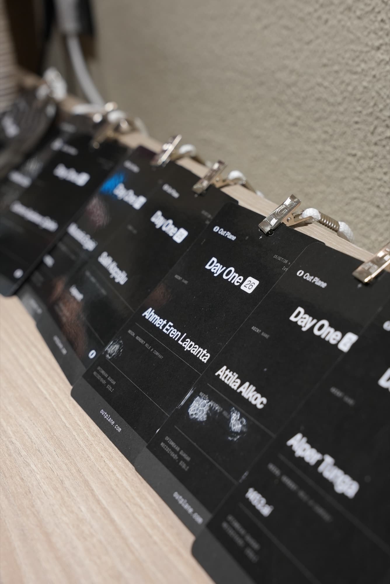 Printed Day One name badges waiting at the entrance